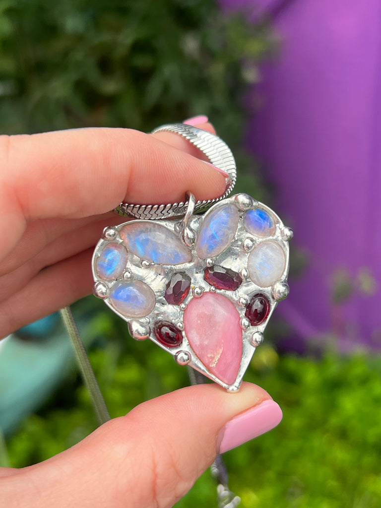 Crystal heart collage pendant