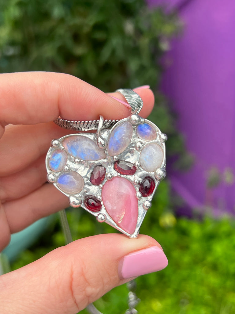 Crystal heart collage pendant