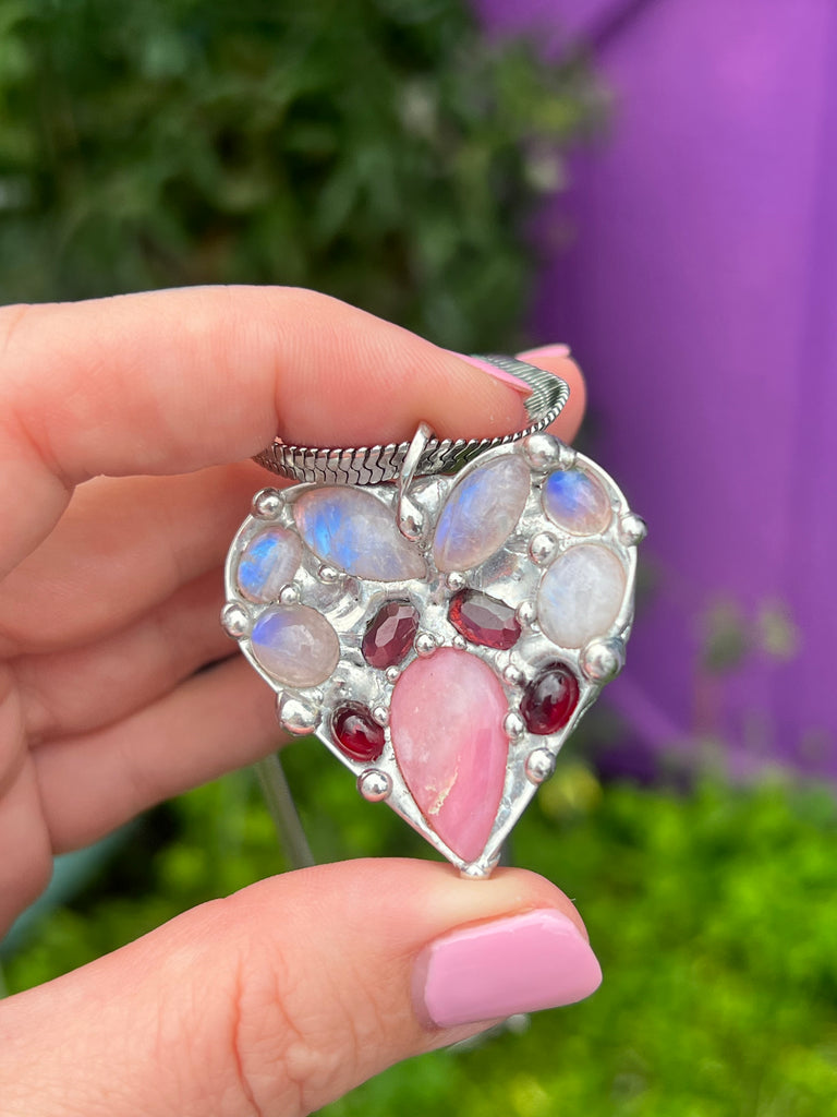 Crystal heart collage pendant