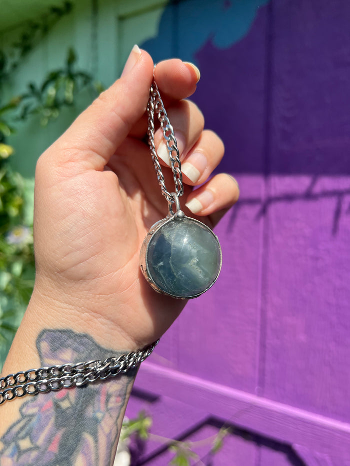 Fluorite sphere amulet