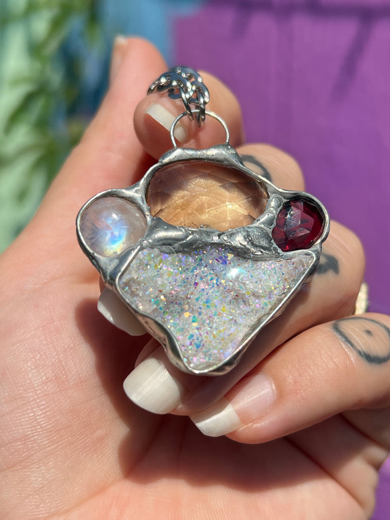 Crystal collage amulet; Aura Quartz, Moonstone, Faceted citrine, & Garnet