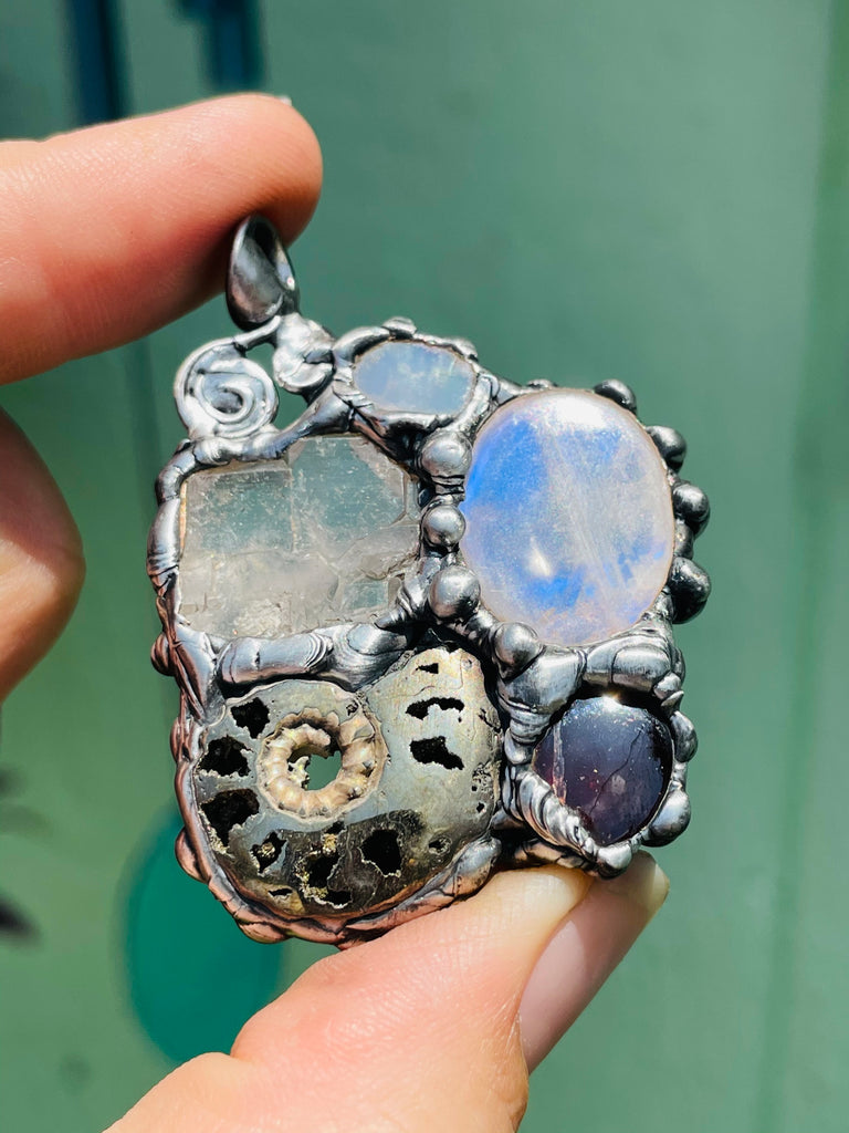 Earth Mother Goddess, Ammonite, Garnet, Moonstone, Herkimer Diamond, and Welo Opal