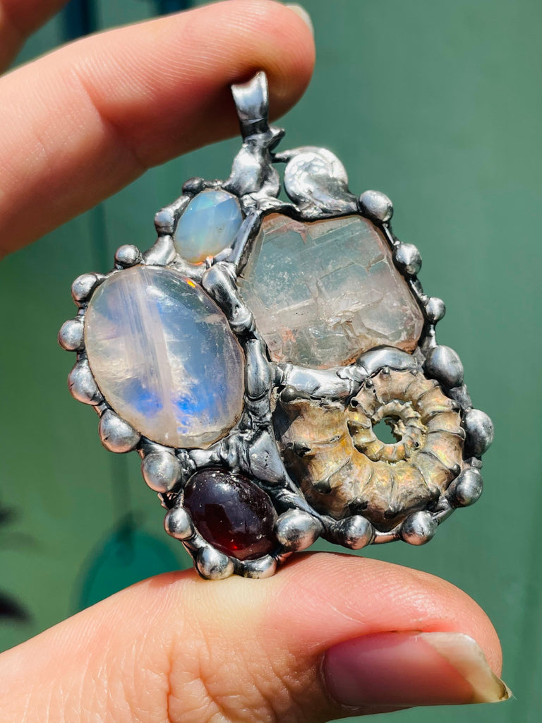 Earth Mother Goddess, Ammonite, Garnet, Moonstone, Herkimer Diamond, and Welo Opal