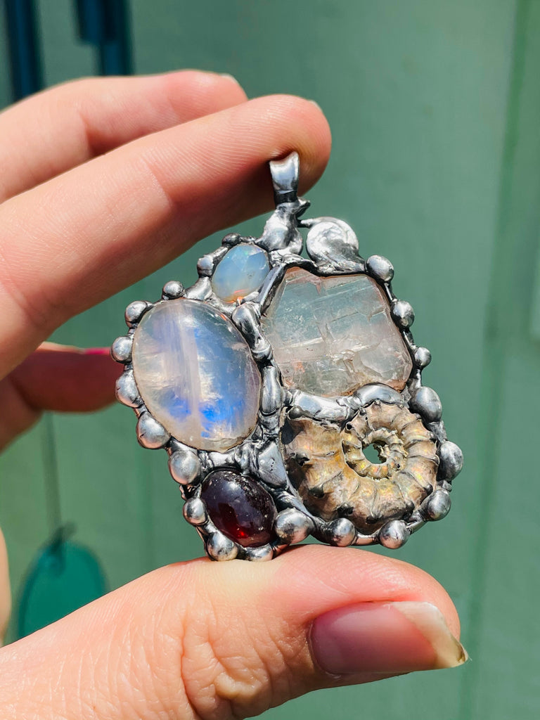 Earth Mother Goddess, Ammonite, Garnet, Moonstone, Herkimer Diamond, and Welo Opal