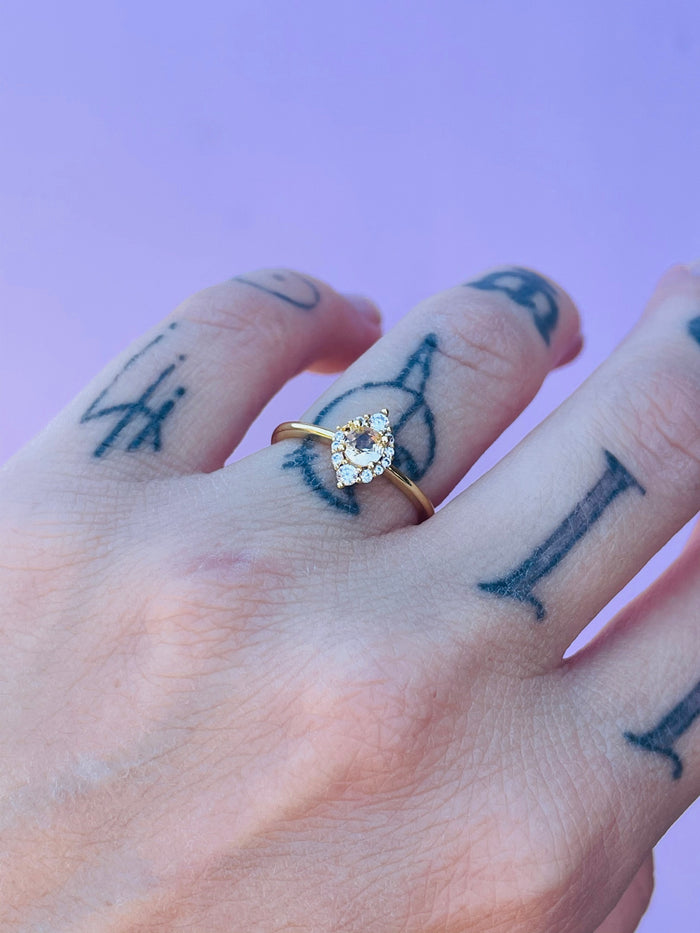 Yellow gold plated ring with sparkly zirconium size 6