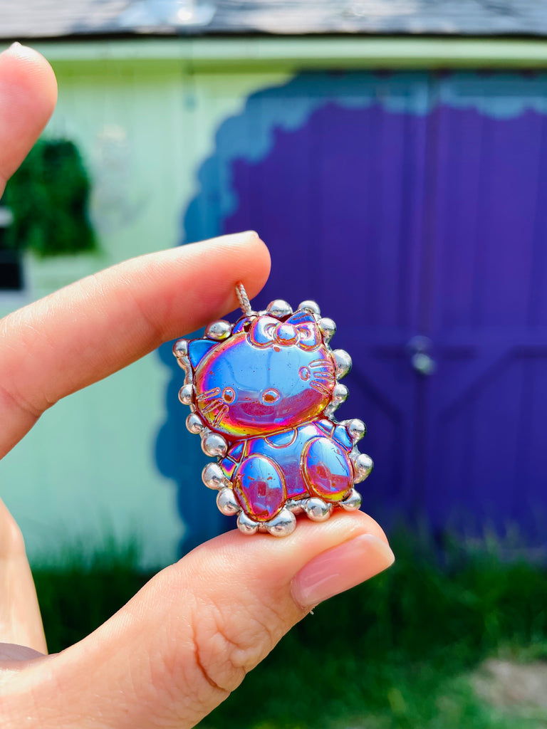 Bubbly Aura carnelian hello kitty pendant