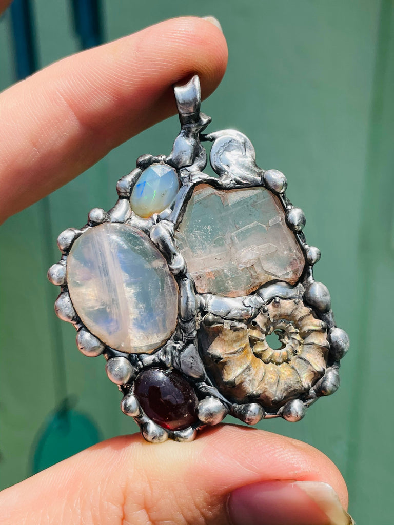 Earth Mother Goddess, Ammonite, Garnet, Moonstone, Herkimer Diamond, and Welo Opal