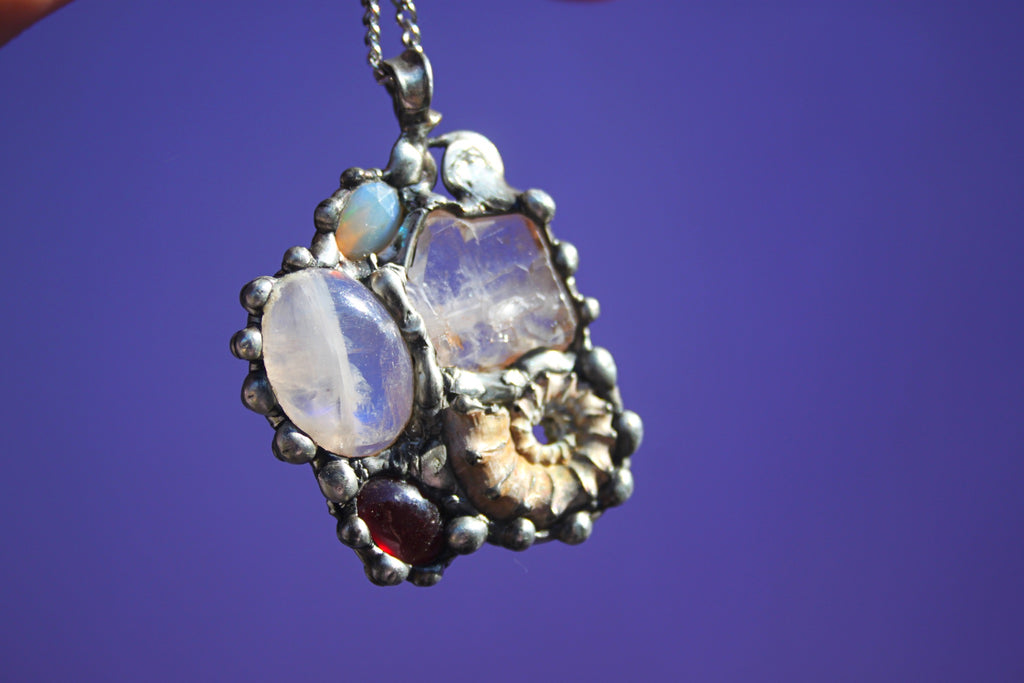 Earth Mother Goddess, Ammonite, Garnet, Moonstone, Herkimer Diamond, and Welo Opal