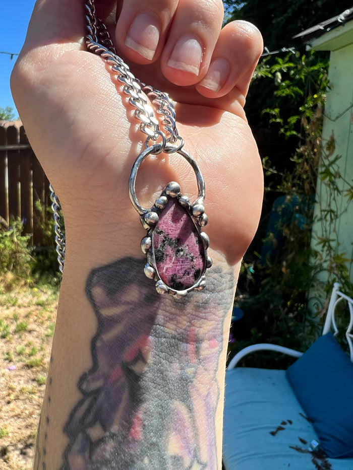 Faceted Rhodochrosite Amulet