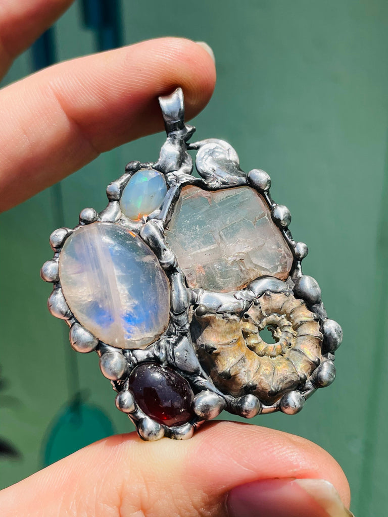 Earth Mother Goddess, Ammonite, Garnet, Moonstone, Herkimer Diamond, and Welo Opal
