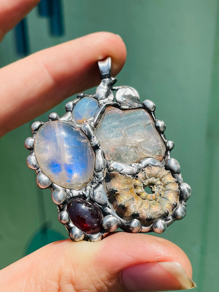 Earth Mother Goddess, Ammonite, Garnet, Moonstone, Herkimer Diamond, and Welo Opal