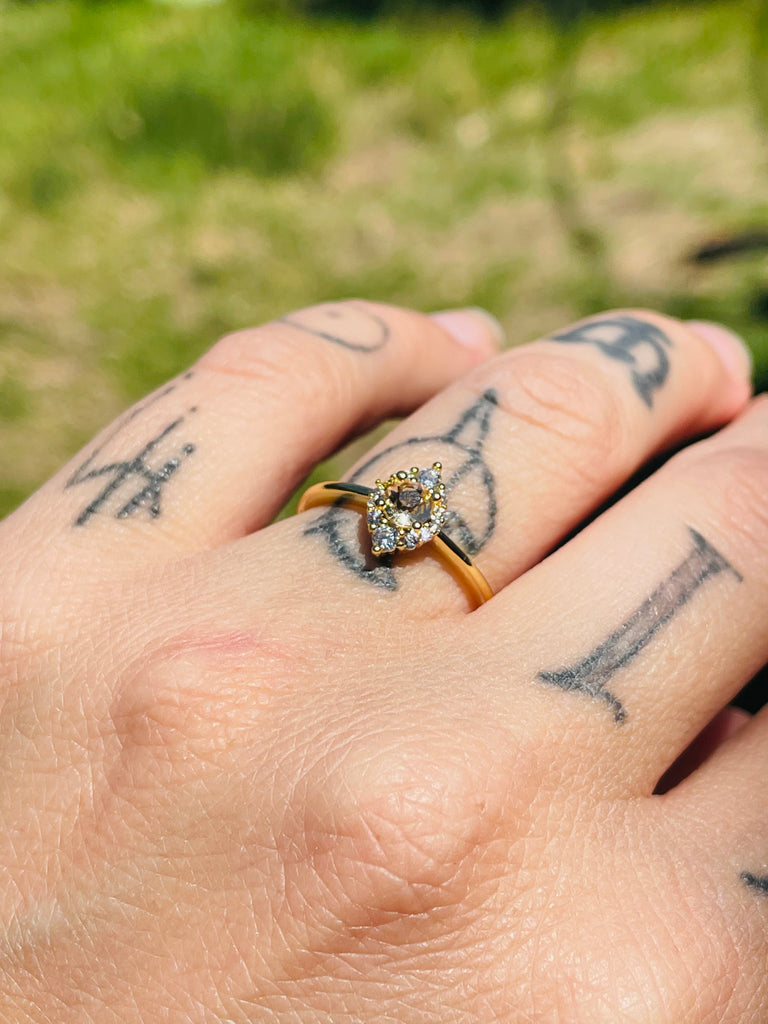 Yellow gold plated ring with sparkly zirconium size 6