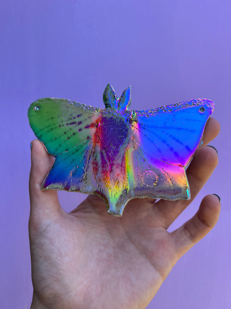Aura coated ceramic Moth