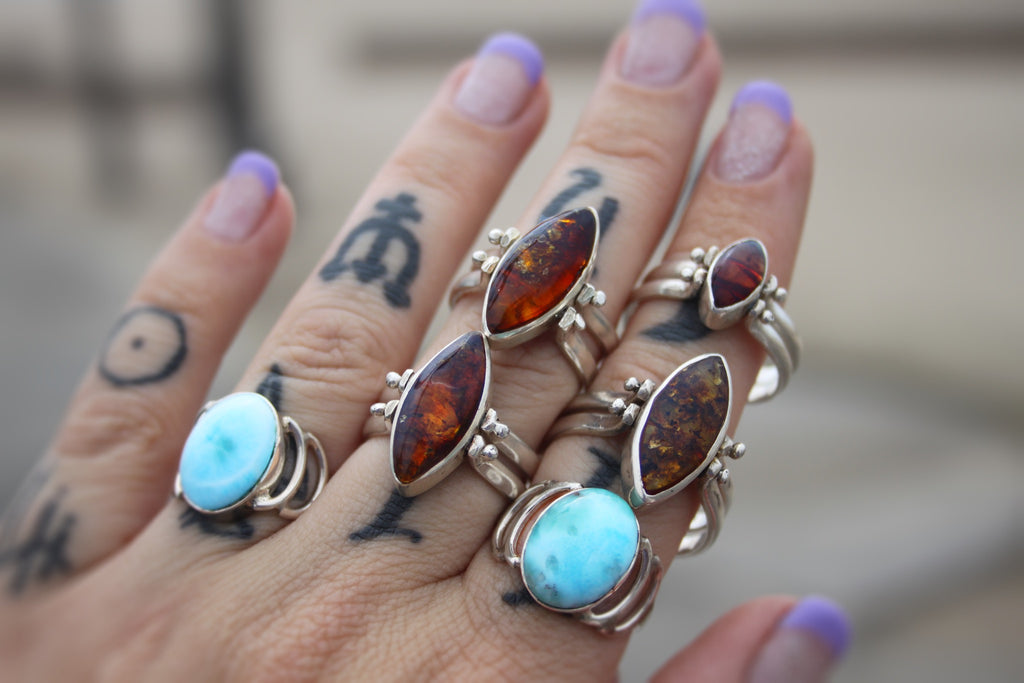 Two sided larimar/Amber rings