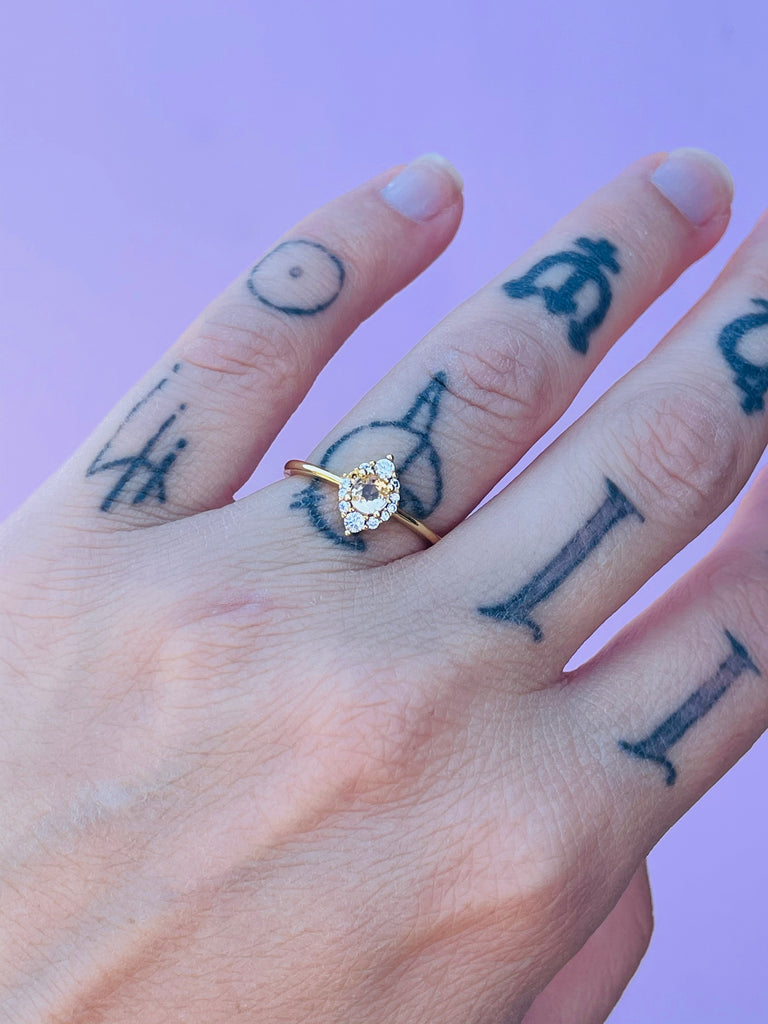 Yellow gold plated ring with sparkly zirconium size 6
