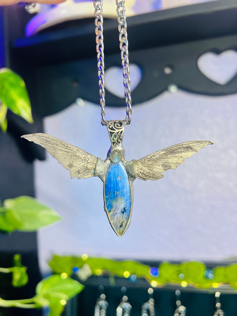 Labradorite with casted hummingbird wings