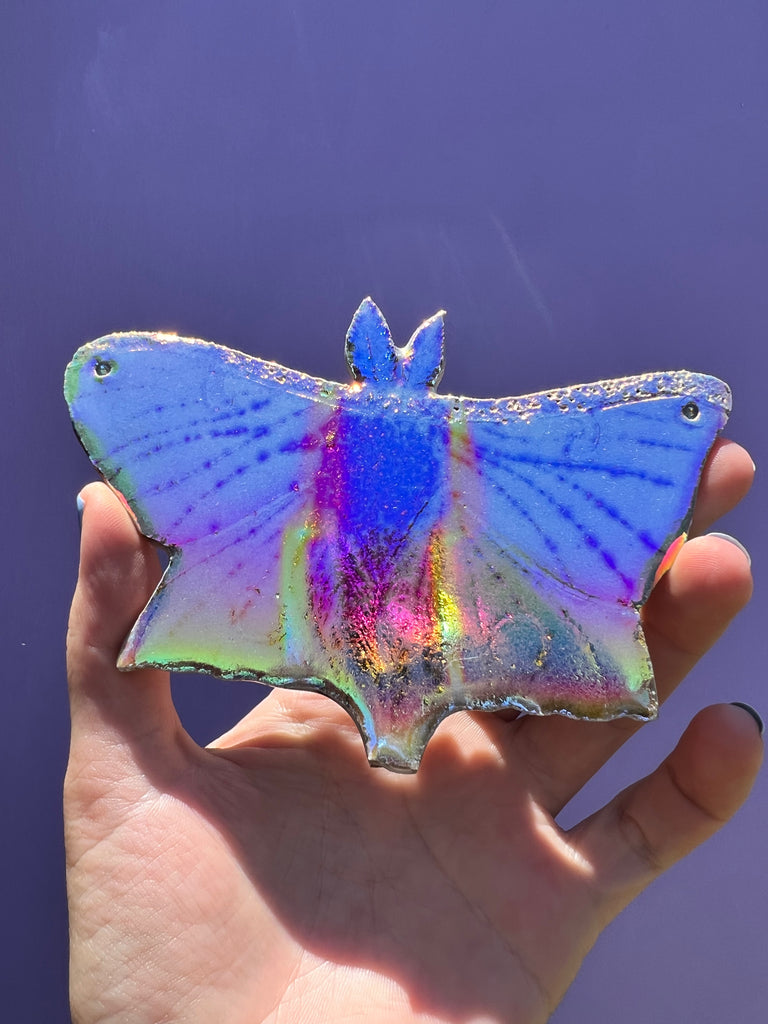 Aura coated ceramic Moth