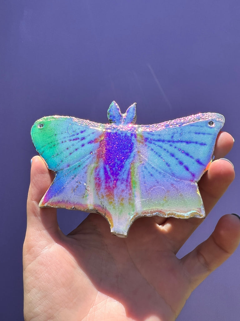 Aura coated ceramic Moth